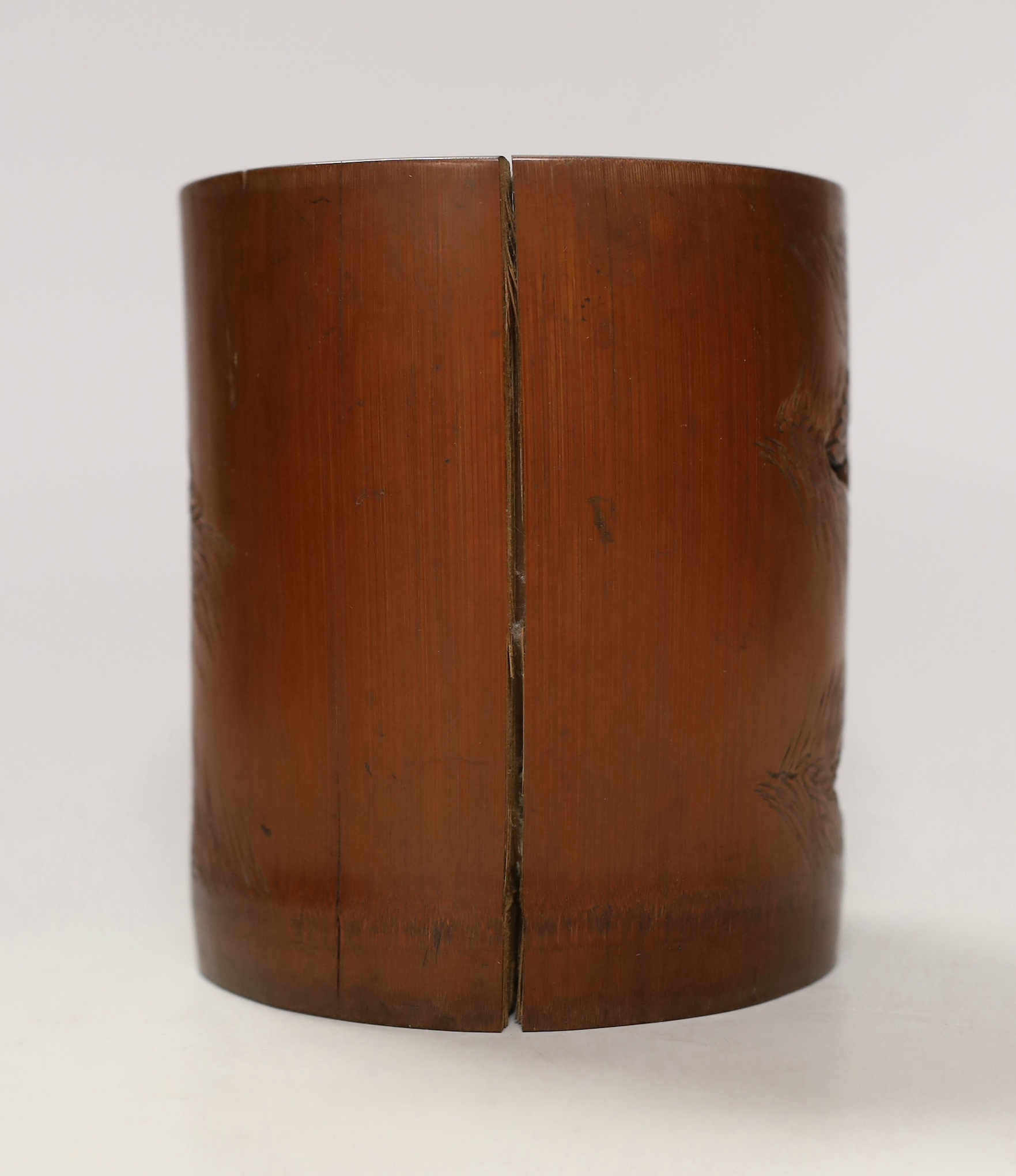 A Chinese 'bamboo' seven sages of the bamboo grove' brushpot, late 19th century, 14.5cm tall